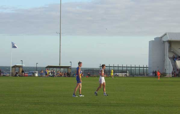 Peter Faulks (left), back from his stint as a Docker, enjoys windy Willy.