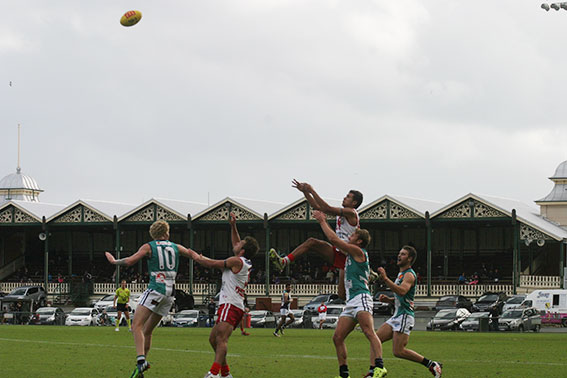 Callum Ah Chee rises on his way to the mark of the day at Fremantle Oval. Photo by Les Everett