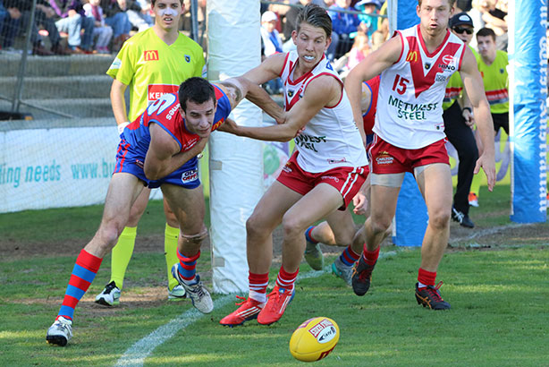 Action close to the point post at Fremantle Oval. Photos by Les Everett